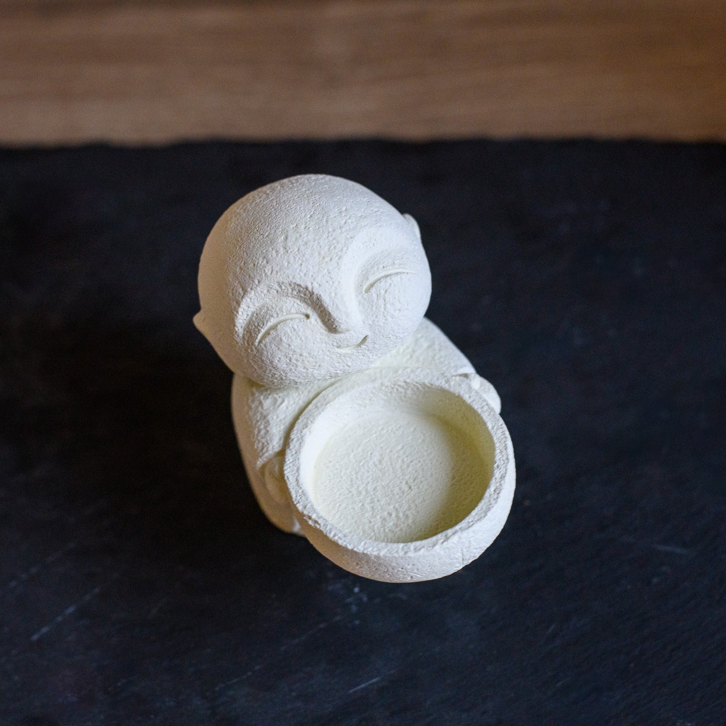 Monk statue candle holder