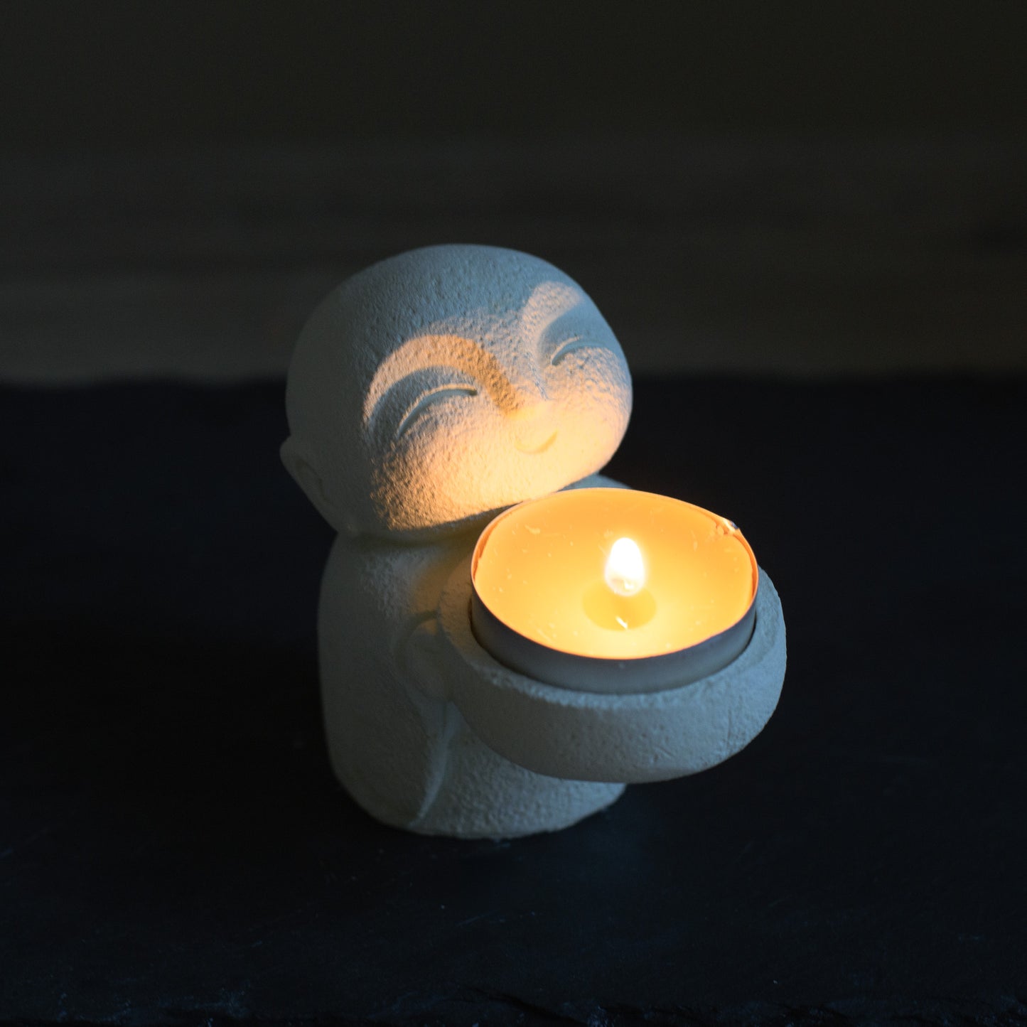Monk statue candle holder