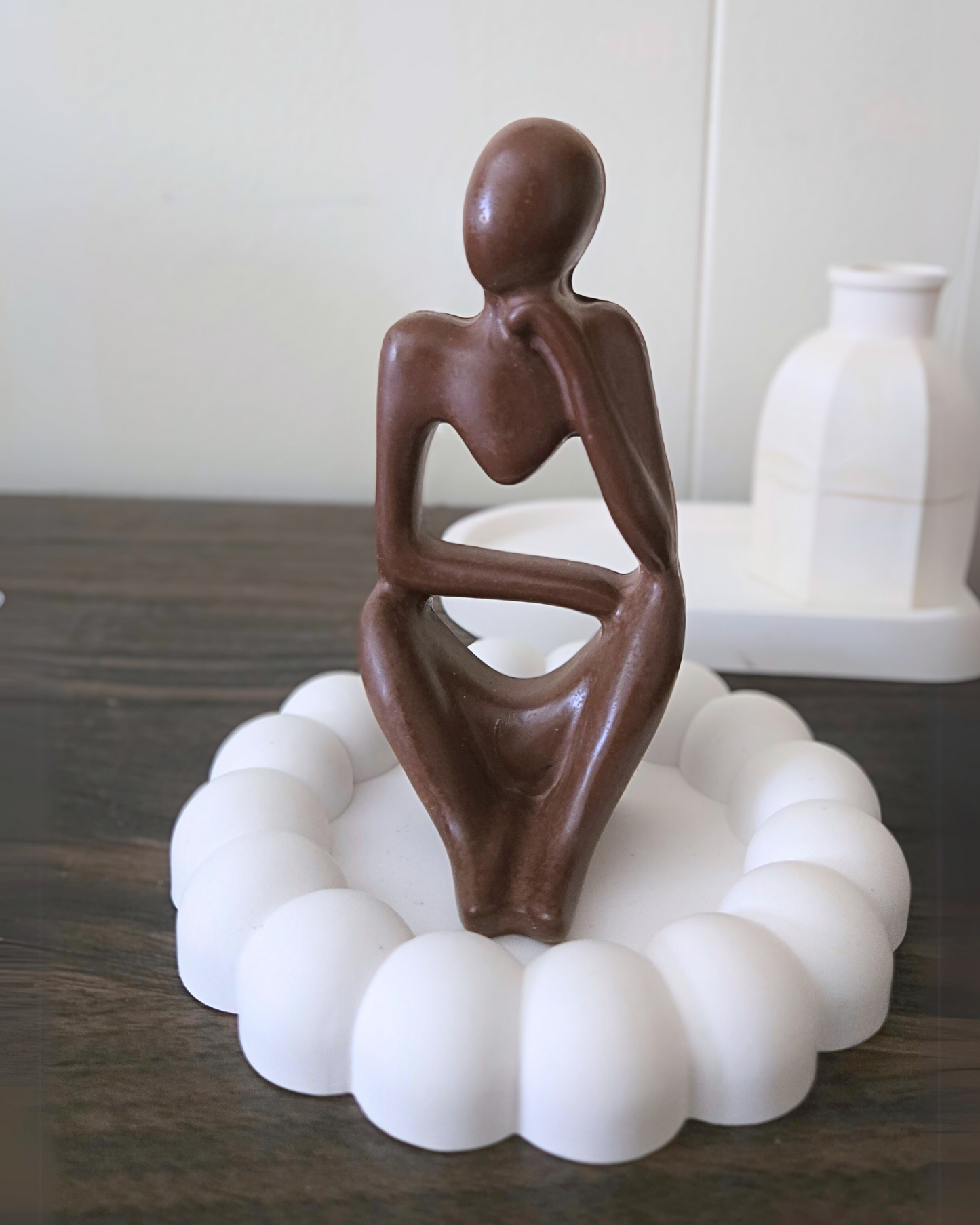 Thinking woman figure
